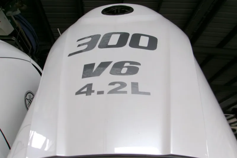 Slide: The Image of 2023 Sportsman Open 282 Center Console with 300 V6 4.2L engine. - 3