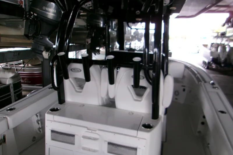 Slide: The Image of 2023 Sportsman Open 282 Center Console with 300 V6 4.2L engine detail. - 4