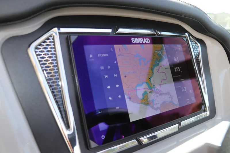 Slide: The Image of Simrad navigation display on 2026 Chaparral 21 SSi OB boat dashboard. - 40