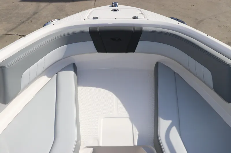 Slide: The Image of 2026 Chaparral 21 SSi OB boat interior with sleek gray seating and modern design. - 46