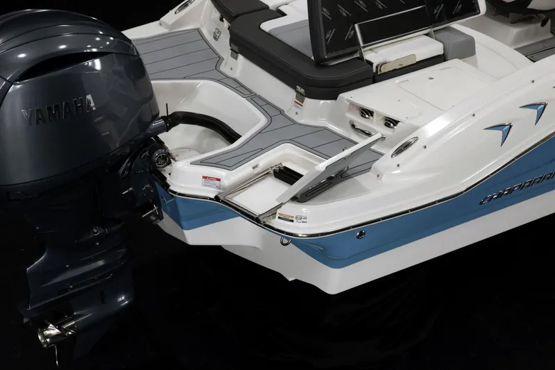 Slide: The Image of Manufacturer Provided Image: 2026 Chaparral 21 SSi OB boat with Yamaha outboard motor, featuring sleek design and seating area. - 8