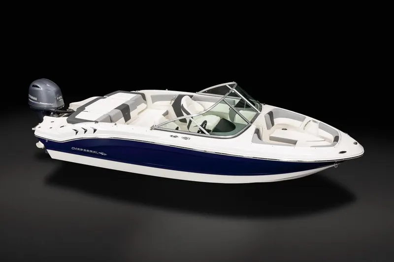 Slide: The Image of Manufacturer Provided Image: 2025 Chaparral 19 SSi OB boat with sleek design and outboard motor, showcased on black background. - 13