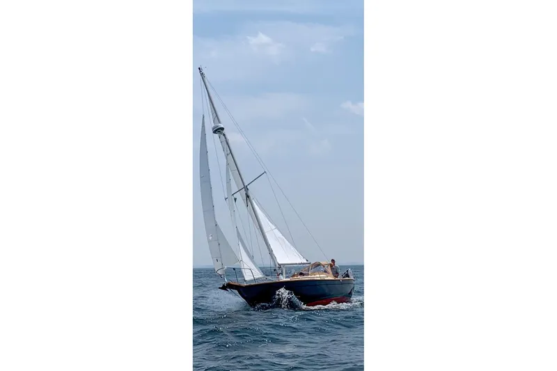 Slide: The Image of Sailing on the ocean, 1999 Southern Cross Cutter with full sails. - 24