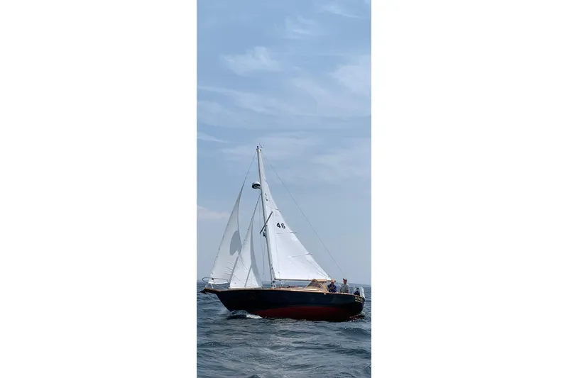 Slide: The Image of Sailing yacht Southern Cross Cutter 1999 on open sea under clear sky. - 25