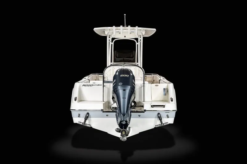 Slide: The Image of Manufacturer Provided Image: 2025 Robalo R222 Explorer boat, rear view with outboard motor, on black background. - 17