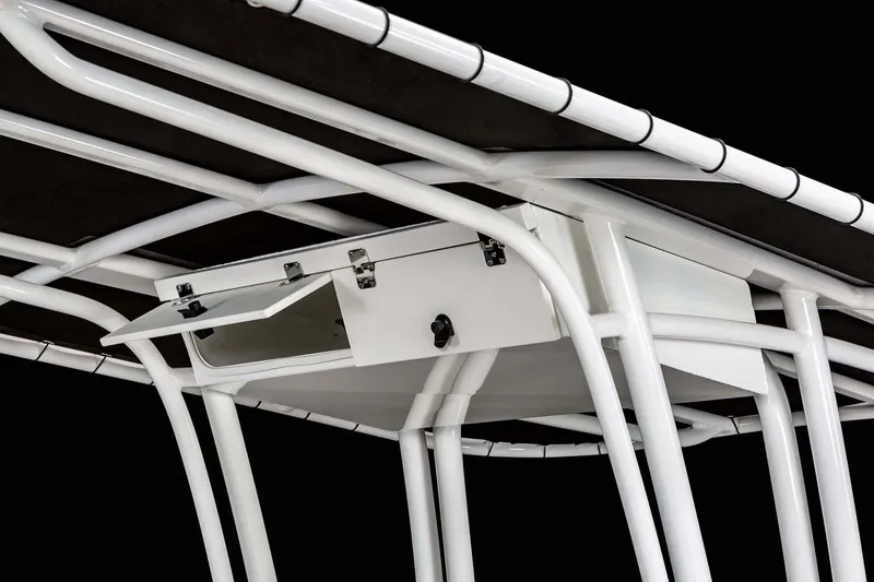 Slide: The Image of Manufacturer Provided Image: Robalo R202 Explorer 2025 T-top storage compartment with white frame, black cover. - 18
