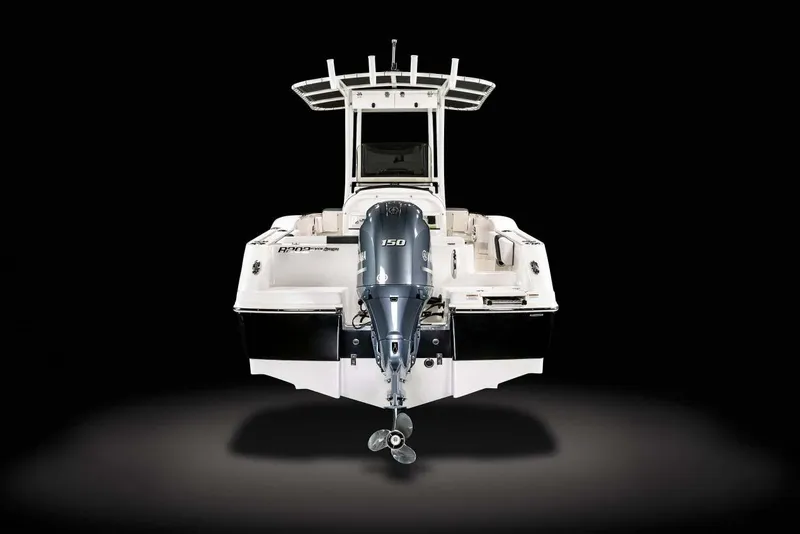 Slide: The Image of Manufacturer Provided Image: 2025 Robalo R202 Explorer boat, rear view with outboard motor, on black background. - 9