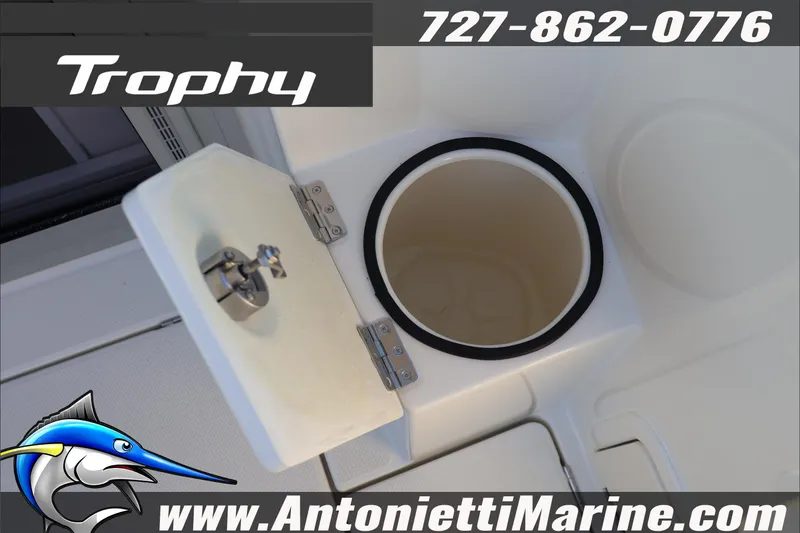 Slide: The Image of 2026 Bayliner Trophy T23 Explorer boat compartment detail with contact information. - 12