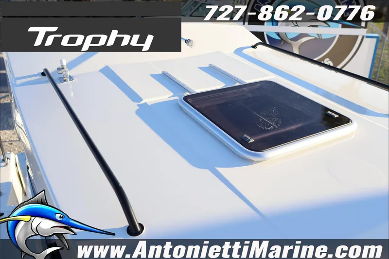 Slide: The Image of 2026 Bayliner Trophy T23 Explorer boat deck with hatch, Antonietti Marine branding. - 16