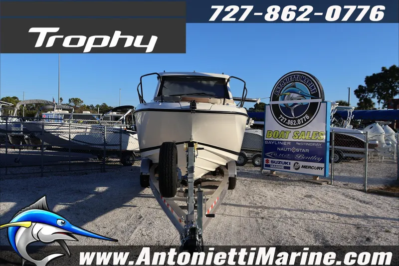 Slide: The Image of 2026 Bayliner Trophy T23 Explorer boat at Antonietti Marine sales lot. - 2