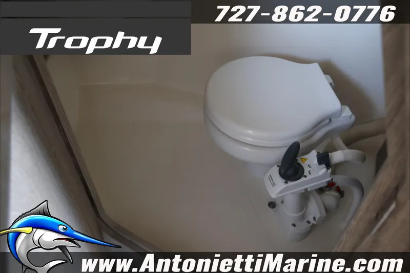 Slide: The Image of 2026 Bayliner Trophy T23 Explorer boat toilet interior, featuring compact marine design. - 21