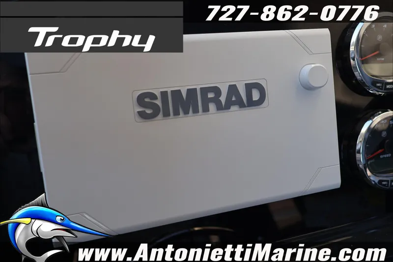 Slide: The Image of Bayliner Trophy T23 Explorer 2026 dashboard with Simrad display and gauges. - 26