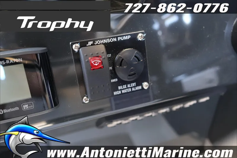 Slide: The Image of 2026 Bayliner Trophy T23 Explorer dashboard with Johnson pump and high water alarm. - 30