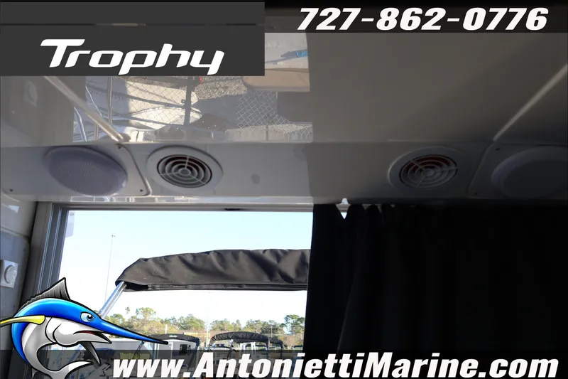 Slide: The Image of 2026 Bayliner Trophy T23 Explorer interior with speakers and vents, Antonietti Marine branding. - 35