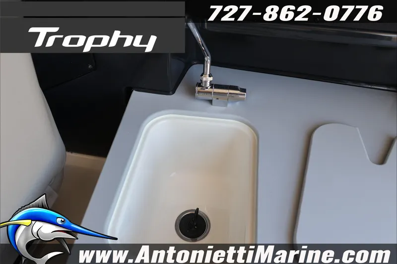 Slide: The Image of 2026 Bayliner Trophy T23 Explorer boat sink and faucet detail, Antonietti Marine branding. - 37