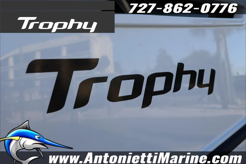Slide: The Image of Bayliner Trophy T23 Explorer 2026 boat logo with contact details and website. - 6