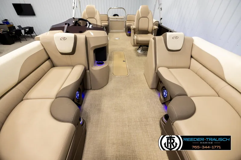 Slide: The Image of Luxurious interior of 2022 Avalon LSZ QL pontoon boat with beige seating and modern design. - 13