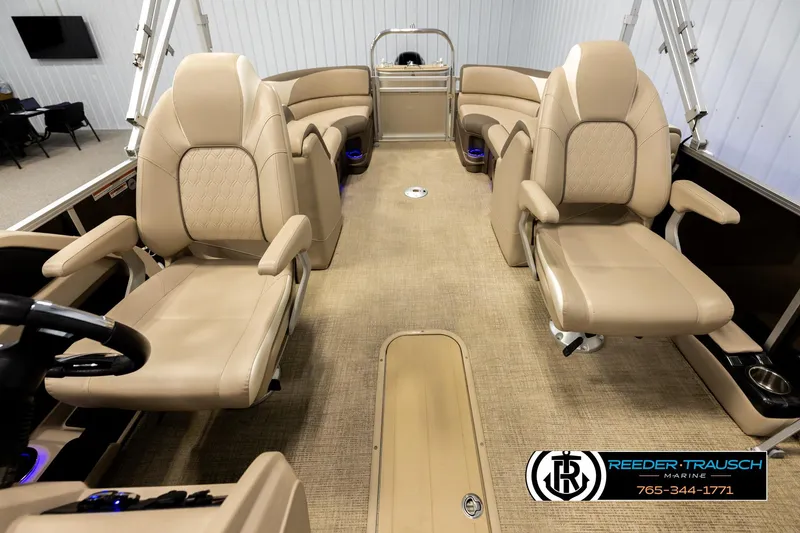 Slide: The Image of Luxurious interior of 2022 Avalon LSZ QL pontoon boat with beige seating. - 14