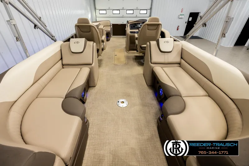 Slide: The Image of Luxurious interior of 2022 Avalon LSZ QL pontoon boat with beige seating. - 16