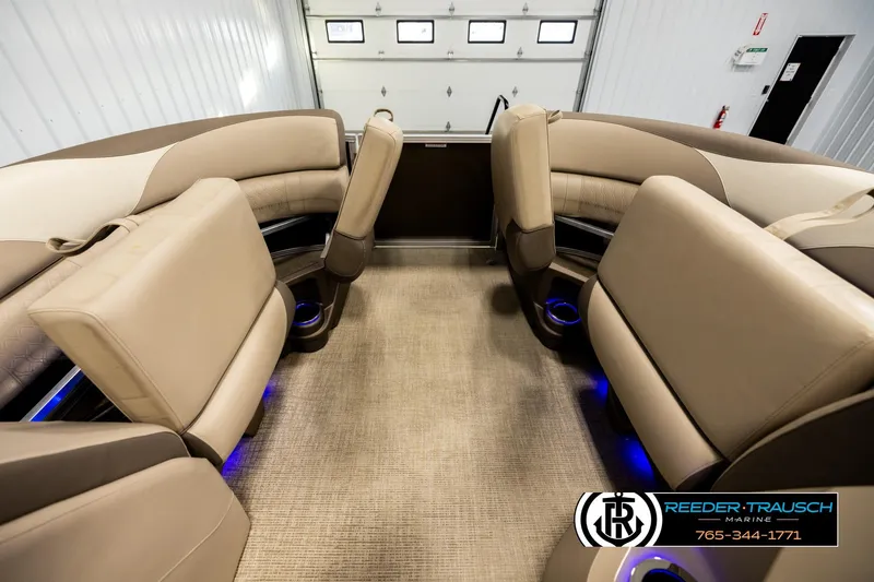 Slide: The Image of Luxurious interior of 2022 Avalon LSZ QL pontoon boat with beige seating. - 19