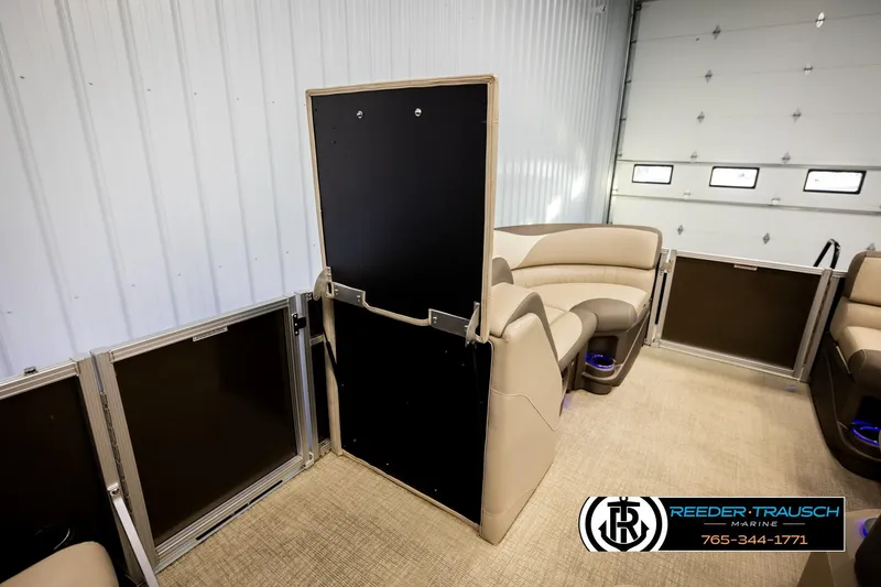 Slide: The Image of Interior of 2022 Avalon LSZ QL pontoon boat with beige seating and modern design. - 24