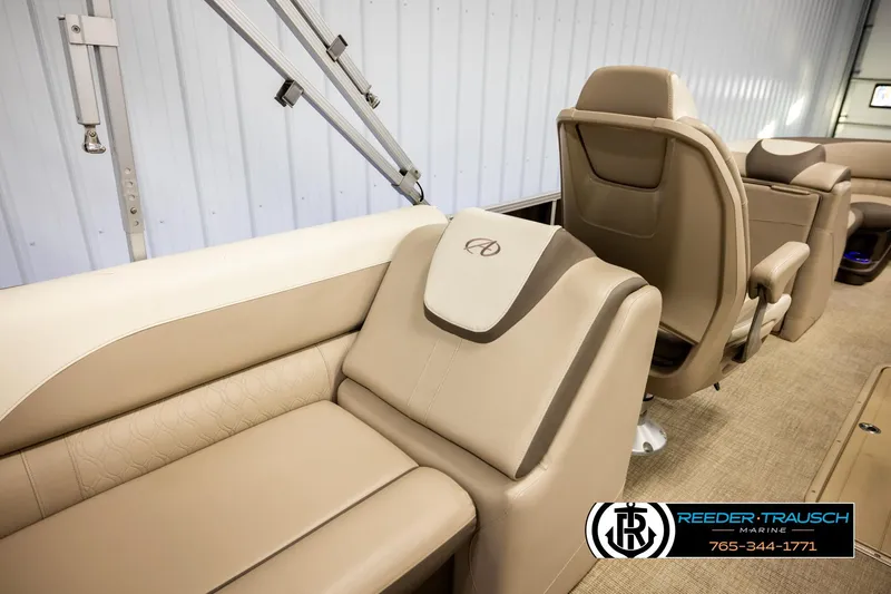 Slide: The Image of 2022 Avalon LSZ QL boat interior with beige seating and modern design. - 25