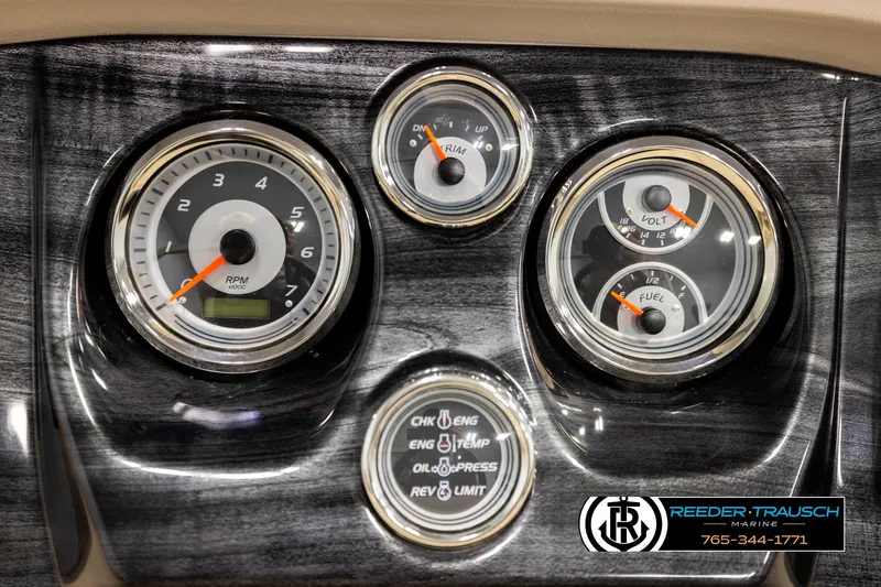 Slide: The Image of Dashboard of 2022 Avalon LSZ QL with RPM, volt, and fuel gauges. - 33