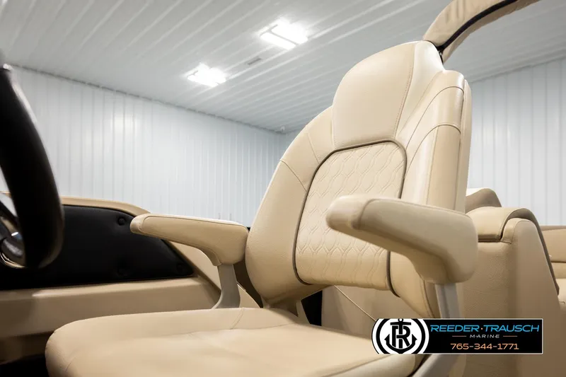 Slide: The Image of Luxurious beige seating in 2022 Avalon LSZ QL boat, indoor showroom setting. - 41