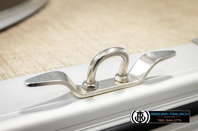Slide: The Image of 2022 Avalon LSZ QL boat cleat with Reeder-Trausch Marine branding. - 57