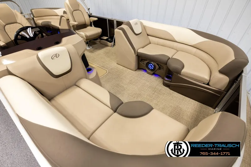 Slide: The Image of Luxurious interior of 2022 Avalon LSZ QL pontoon boat with beige seating and modern design. - 9