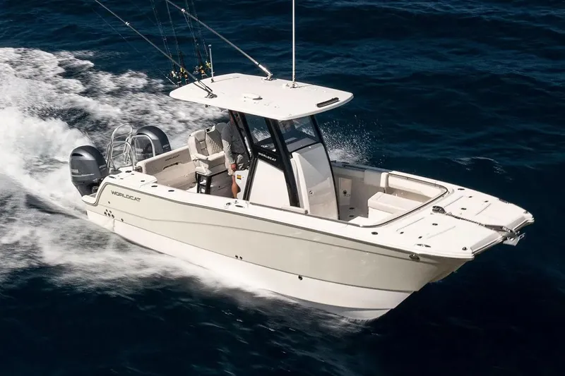 Slide: The Image of Manufacturer Provided Image: 2026 World Cat 265 CC-X cruising on open water, showcasing sleek design and powerful engines. - 2