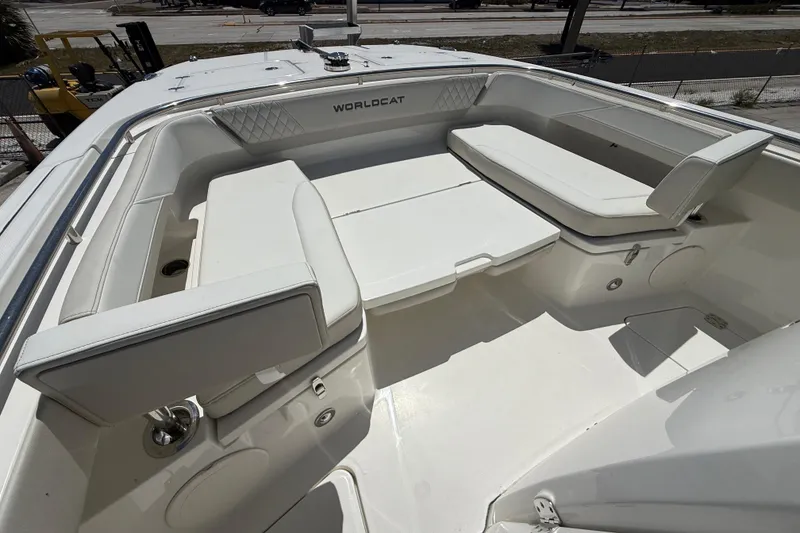 Slide: The Image of 2026 World Cat 265 CC-X boat interior with white seating and spacious layout. - 7