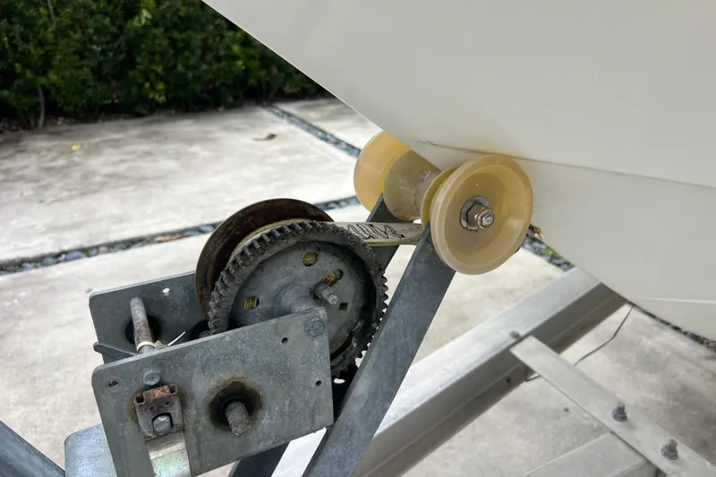 Slide: The Image of Trailer winch and rollers for 2005 Mako 2101 Inshore boat. - 8