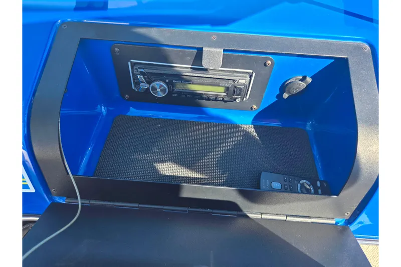 Slide: The Image of Glastron GT 205 2013 boat dashboard with Sony stereo and remote control. - 17