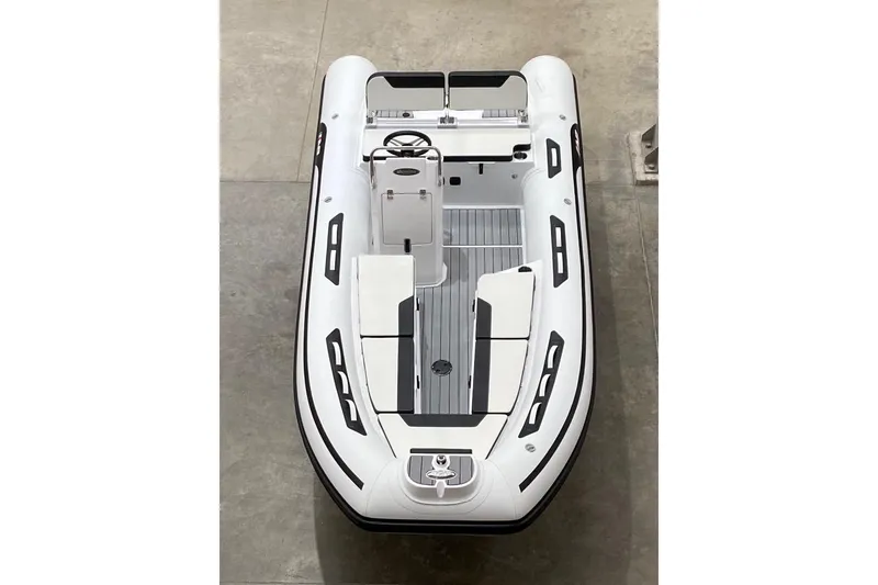 Slide: The Image of 2026 AB Inflatables Alumina 16 ALX boat, top view, sleek design, white and black accents. - 3