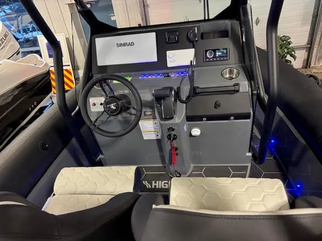 Slide: The Image of Interior view of Highfield ADV7 2026 boat cockpit with modern controls. - 11