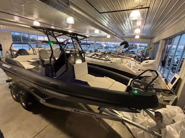 Slide: The Image of 2026 Highfield ADV7 boat in a showroom. - 6