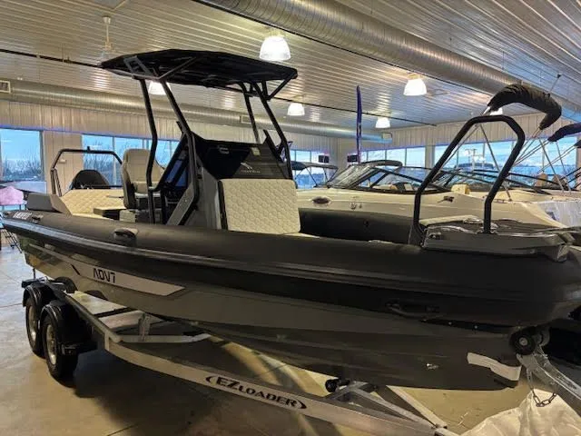 Slide: The Image of 2026 Highfield ADV7 boat in a showroom. - 7