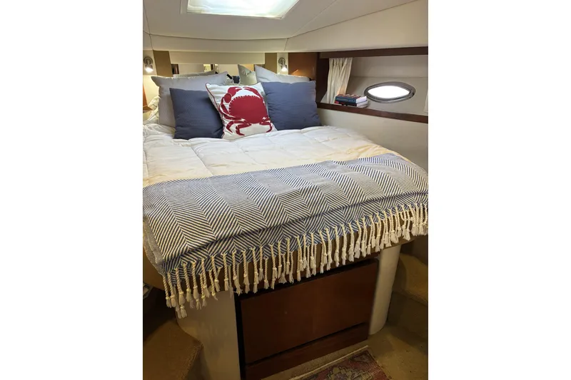 Slide: The Image of Luxurious cabin interior of 2008 Sea Ray 38 Sundancer yacht with cozy bedding. - 10