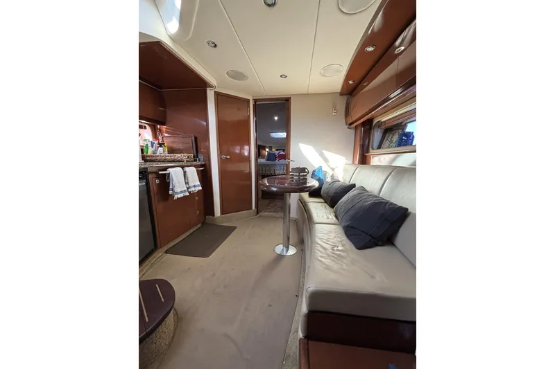 Slide: The Image of Luxurious interior of 2008 Sea Ray 38 Sundancer yacht with cozy seating and modern amenities. - 11