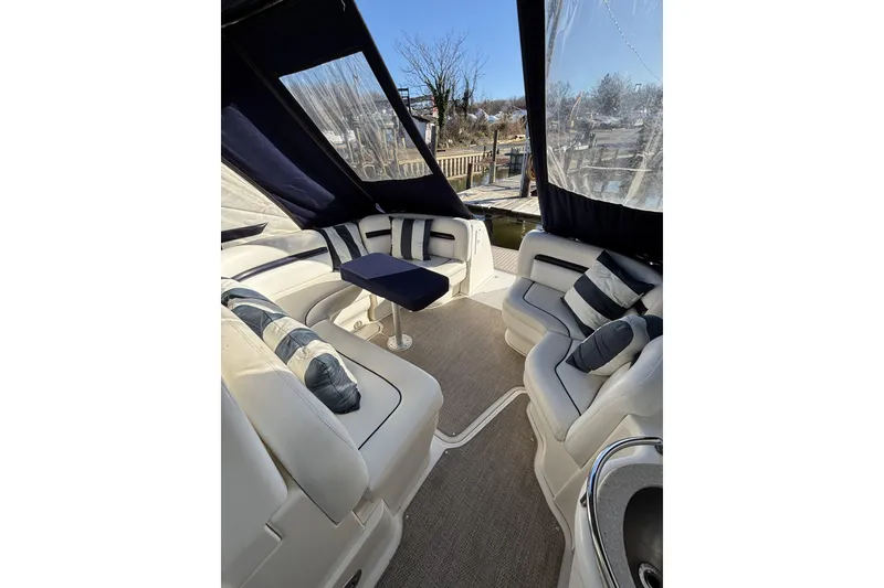 Slide: The Image of Interior of 2008 Sea Ray 38 Sundancer yacht with plush seating and elegant design. - 5