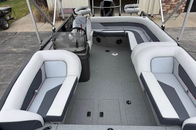 Slide: The Image of 2026 Lowe Sport Deck 224 interior with spacious seating and modern design. - 16