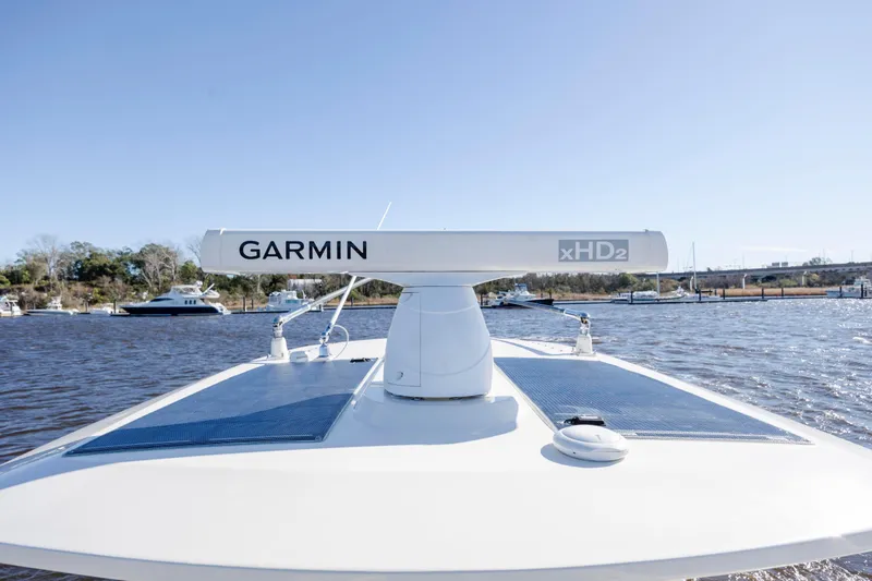 Slide: The Image of 2019 Scout 355 LXF boat with Garmin xHD2 radar on water. - 35