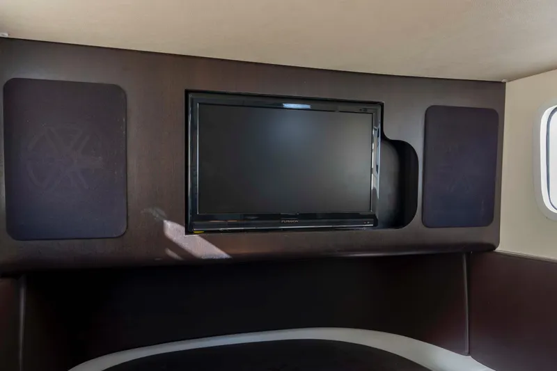 Slide: The Image of 2019 Scout 355 LXF cabin interior with TV and speakers. - 41