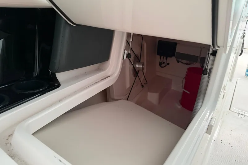 Slide: The Image of Interior view of 2016 Boston Whaler 270 Vantage boat storage compartment. - 15