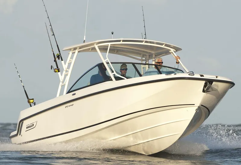 Slide: The Image of Manufacturer Provided Image: 2016 Boston Whaler 270 Vantage boat cruising on water. - 26