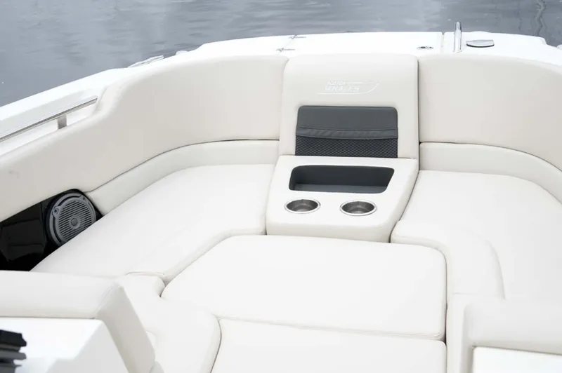 Slide: The Image of Manufacturer Provided Image: 2016 Boston Whaler 270 Vantage boat interior with cushioned seating and cup holders. - 27