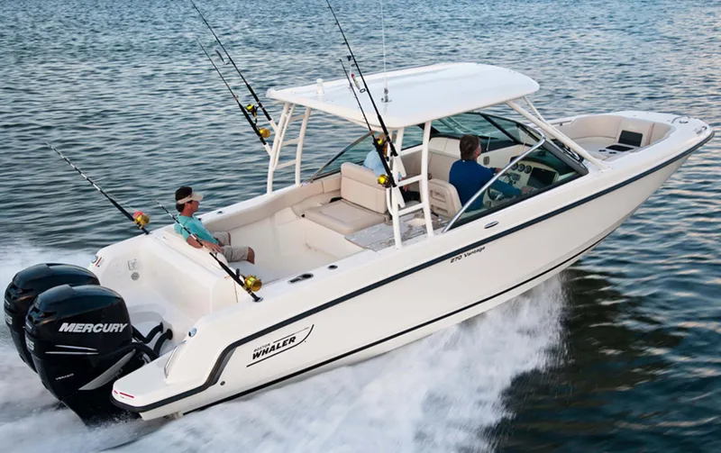 Slide: The Image of Manufacturer Provided Image: 2016 Boston Whaler 270 Vantage boat cruising on water with fishing rods. - 28