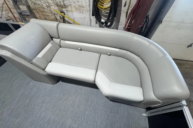 Slide: The Image of Luxurious seating on 2026 Godfrey Xperience 2286 SBX pontoon boat, featuring sleek gray upholstery. - 4