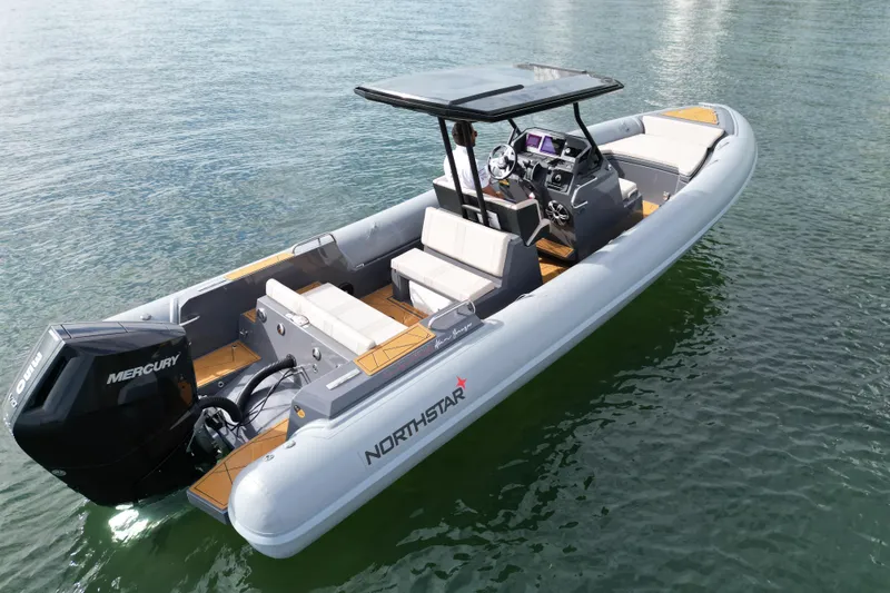 The Image of 2026 Northstar Orion 8 boat on water, featuring Mercury engine and modern design. - 0